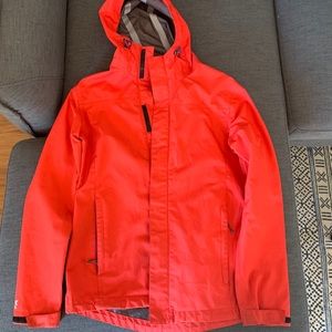 Orange red women’s raincoat